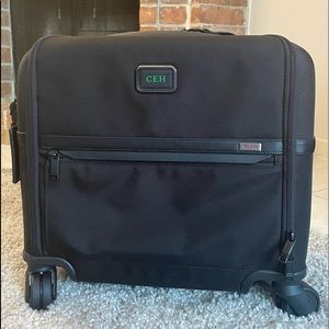 Tumi, Alpha Three, 4-wheeled brief case with charging slot-usb, new Tumi lock.